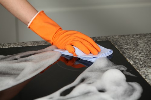 Professional window cleaning on a London residential street