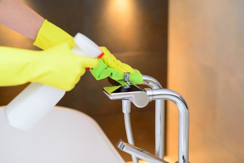 Commercial cleaning team maintaining a busy London office kitchen and break area