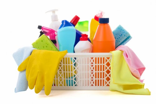 Domestic cleaning in a London living room with attention to detail