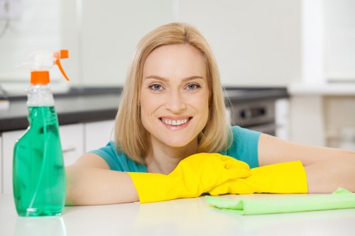 Local cleaner handling a commercial office corridor in London