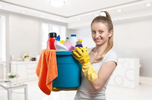Professional cleaner preparing a property with safety checks in place