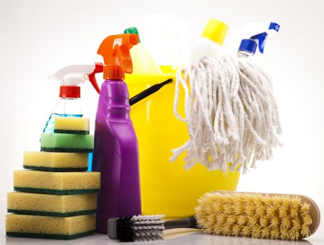 Cleaner detailing a London property after renovation work with careful surface cleaning